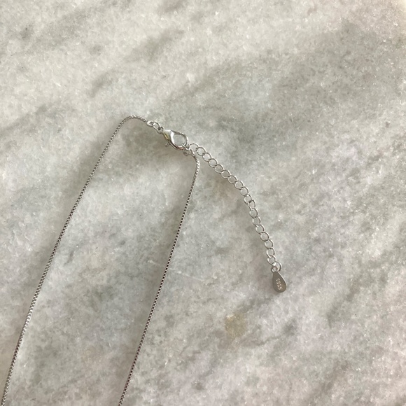 Sterling Silver Criss-Cross Stunning Simulated Diamond Silver Pendant Necklace - Picture 9 of 10